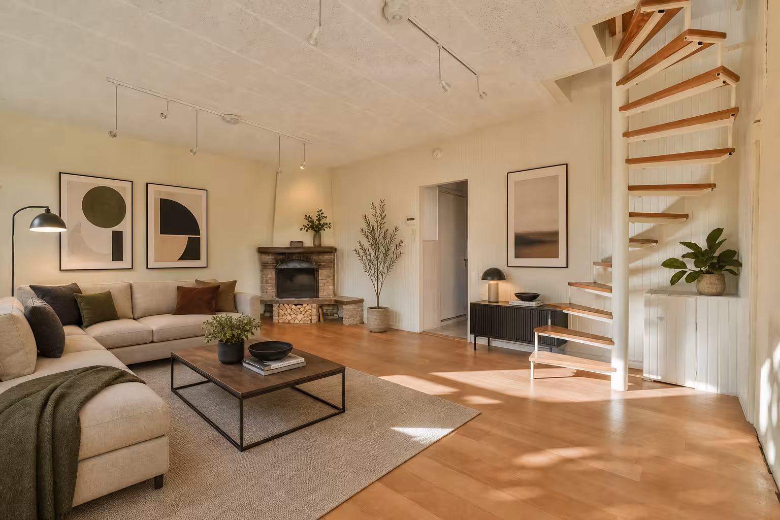 Modern Scandinavian living room with floating wood staircase, neutral sofa, fireplace, and warm wood flooring.